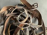 a pile of old tools that are on a table