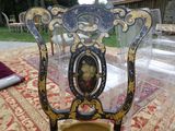a chair that has a picture on the back of it
