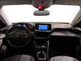 the interior of a car with a dashboard and steering wheel