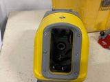 a yellow box and a yellow case sitting on a table
