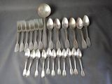 a lot of spoons and spoon spoons on the table