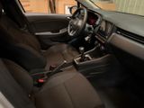 a car that has a steering wheel and a dashboard
