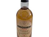 une image représentant une bouteille de whisky sur fond blanc