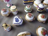 many different types of porcelain objects on the table