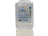 an image of a bottle of liquid on a white background