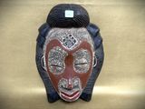 an image of a mask on a wall