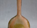 a small vase that is sitting on a table