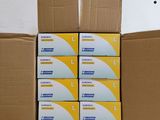 several boxes of toilet paper stacked on top of each other