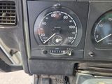 a close up of a speedometer and gauge on a motorcycle