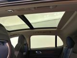 a view of the sunroof of a car from the inside