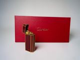 a close up of a red box with a lighter in it