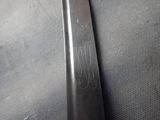 a close up of a knife on a table