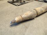a metal object that is laying on the ground