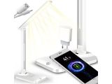 an image of a cell phone is sitting on a table with a lamp