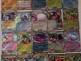 beaucoup de cartes pokemon sur la table