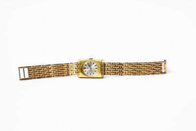 an image of a gold wrist watch with a white face on a white background