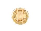an image of a gold sunburst brooch on a white background