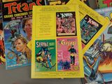 a lot of comic books on the table