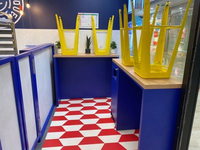 a red and white checkered floor in a restaurant