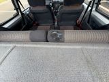 a seat belt in the back of a vehicle