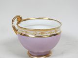 bol en porcelaine violet et doré avec une anse