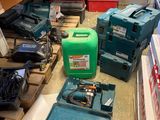 many different tools on the floor in this room