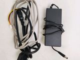 a power cord and a charger on the table