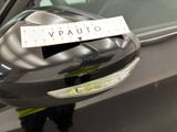 a sticker on the side mirror of a car