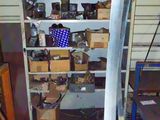 a shelf full of assorted items in a garage