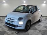 la photo d'une petite voiture blanche garée dans un garage