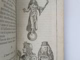 an open book with a drawing of a man and a woman