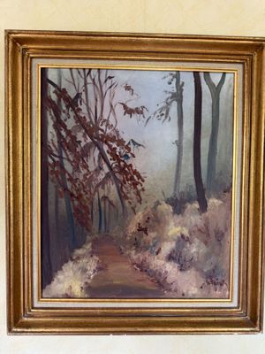 a painting of a path in the woods on the wall