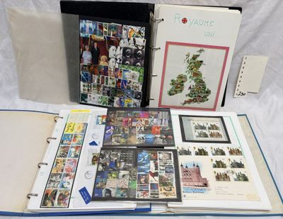 a lot of books that are open on a table
