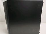 an image of a black computer case sitting on top of a white surface