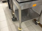 a machine that is sitting on the floor in the kitchen
