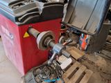 a machine that is sitting on a pallet in a garage