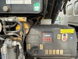 a close up of a machine that is sitting on the ground