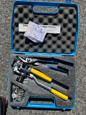 a blue case with tools in it on the ground