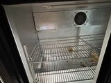 an open refrigerator with a lot of food inside of it