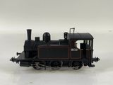 a toy train that is sitting on a white surface