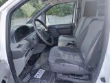 an image of a van with the driver ' s seat down