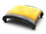 yellow and black foot stool on a white surface with a white background