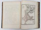 an open book with a map of the united states on it