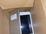 a box with a tablet inside of it that is in it