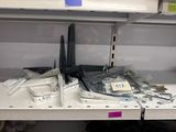 a lot of electronics on the shelves in the store