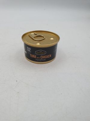 une boîte de thon et de poulet posée sur une table