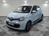 a picture of a small blue car parked in a garage