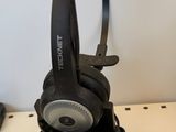 a pair of headphones sitting on top of a table