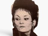 black and white photo of a woman with a veil on her head