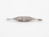 an antique diamond three stone broochle pin